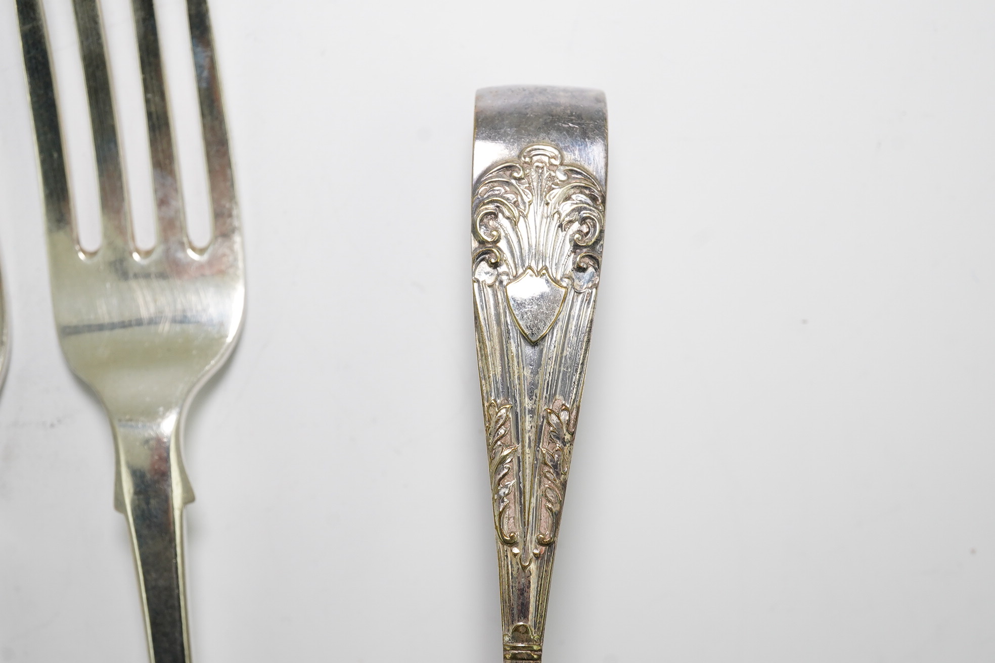 Eighteen items of assorted Victorian silver fiddle pattern flatware, various dates and makers